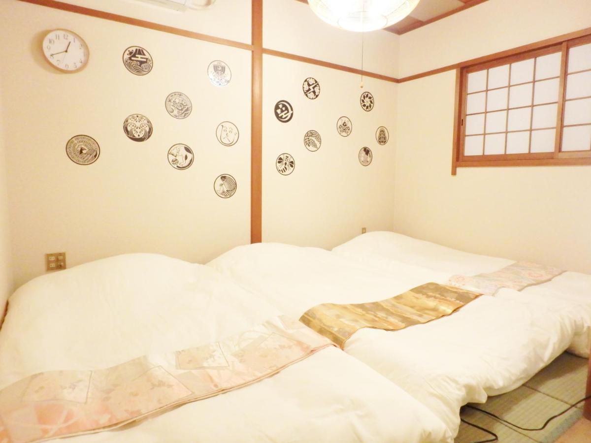 Appartamento Dotonbori Mansion Osaka Esterno foto