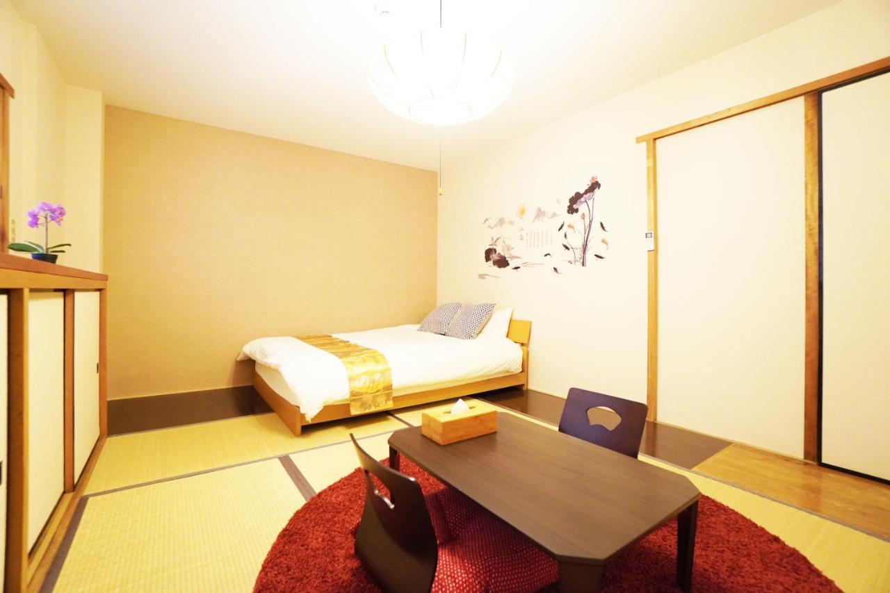 Appartamento Dotonbori Mansion Osaka Esterno foto